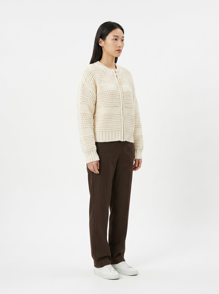 Covert Club chunky knit sweater, three-quarter angle