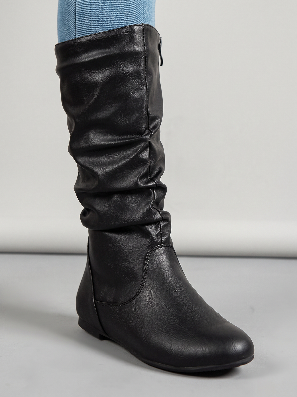 Women's Slouch Boots – Faux Leather Mid-Calf Flat Boots in Black – close-up
