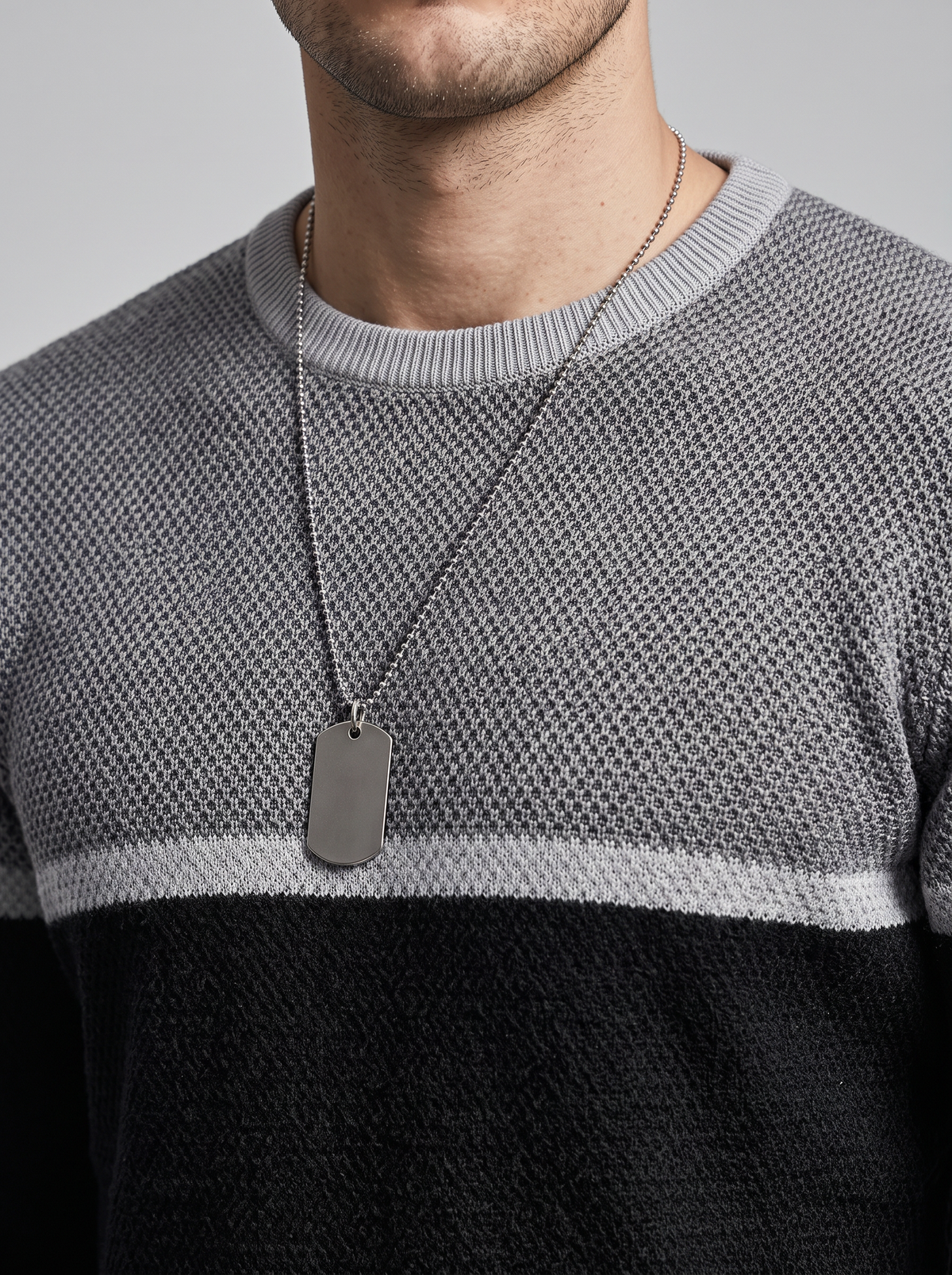 Men's Jumper – Two-Tone Colour Block Knit Sweater in Grey & Black – close-up of knit